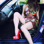 Hot crossdresser in red spike heels
